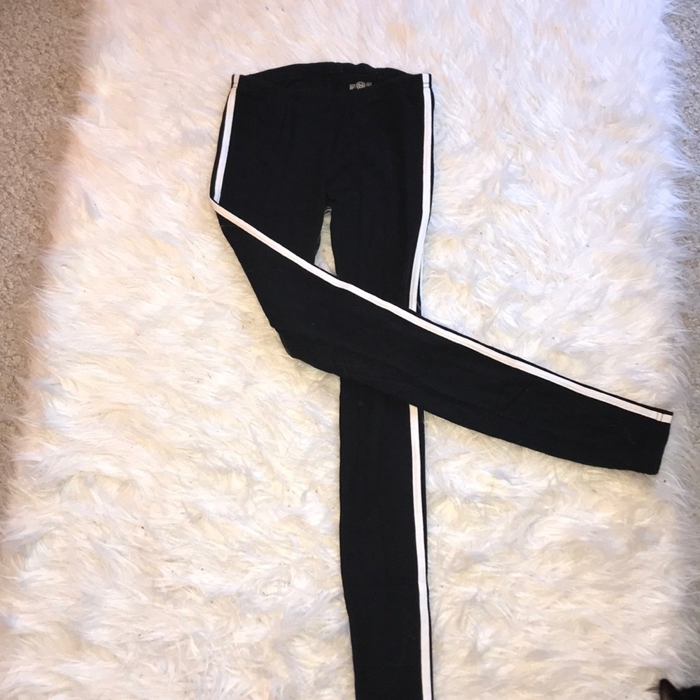 Black leggings, white striped sides
